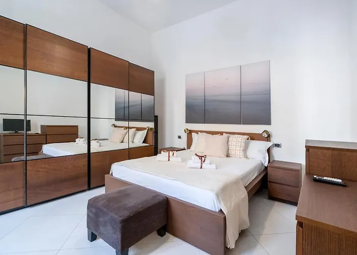 Апартаменты Guesthost - Stazione & Policlinico